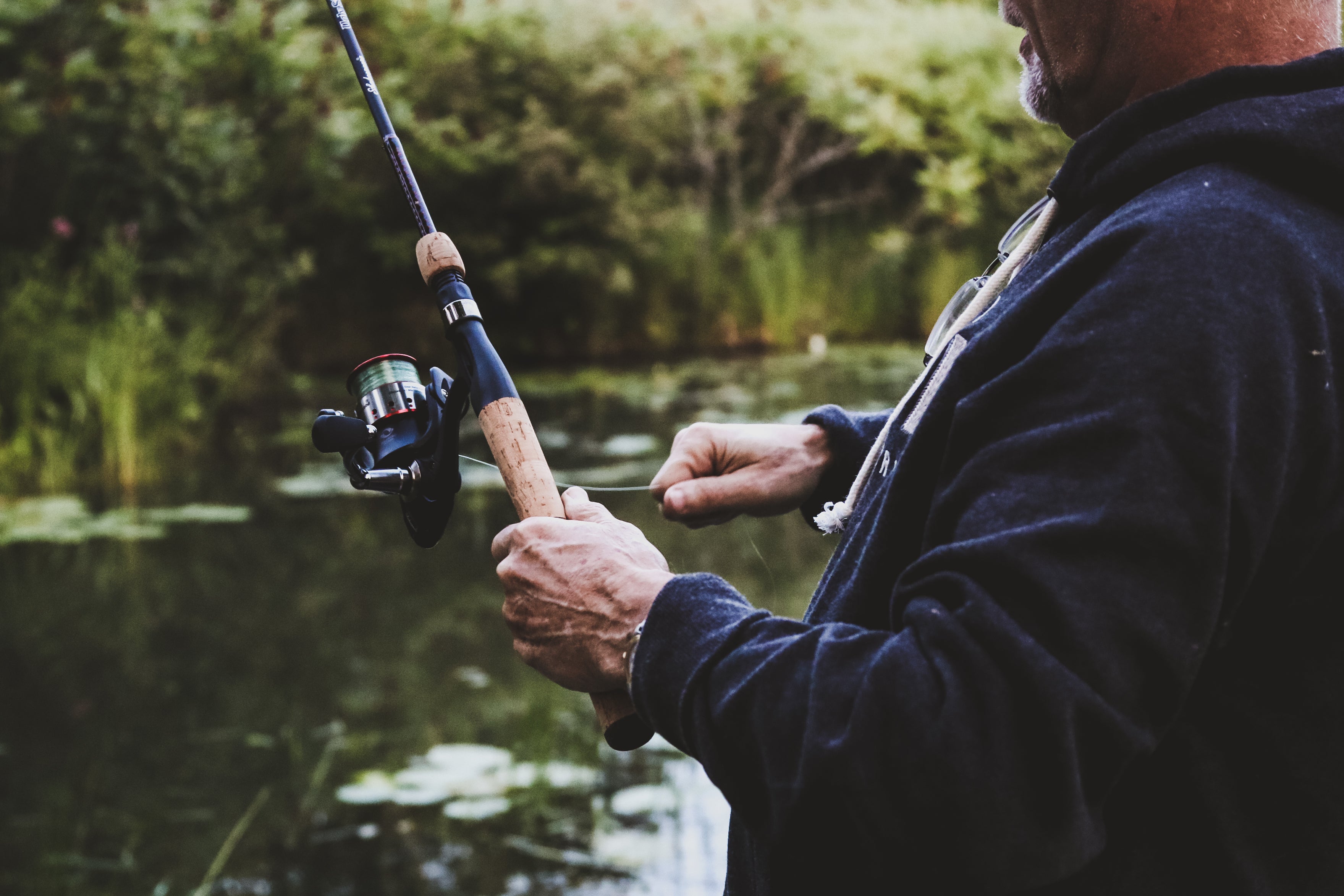 files/man-reeling-in-on-fishing-rod.jpg